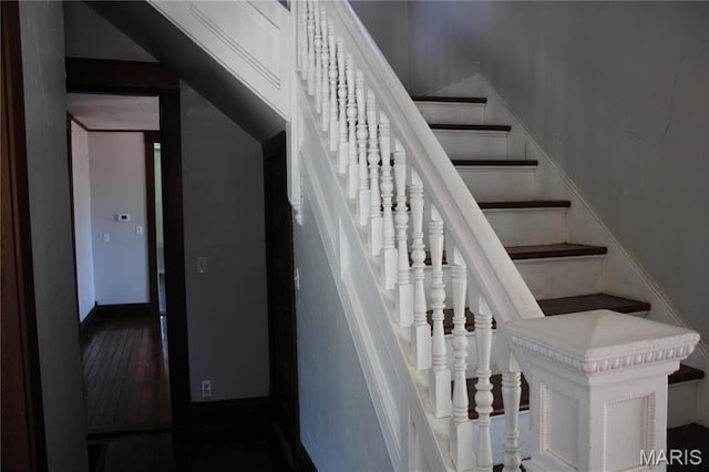 408 W Locust St, Paris, MO 65275 - stairs featuring wood finished floors and baseboards