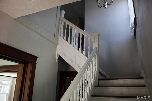 408 W Locust St, Paris, MO 65275 - stairs featuring a chandelier