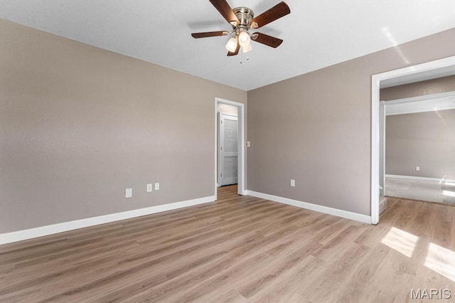 525 Homestead Ave, Swansea, IL 62226 - unfurnished bedroom with light wood-style floors and ceiling fan
