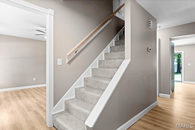 525 Homestead Ave, Swansea, IL 62226 - stairway with wood finished floors and a ceiling fan