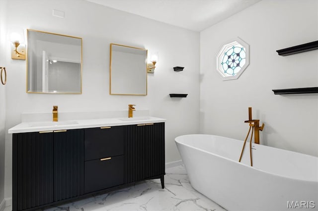 525 Homestead Ave, Swansea, IL 62226 - bathroom featuring marble look tile flooring, double vanity, and a soaking tub