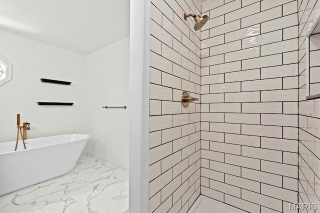 525 Homestead Ave, Swansea, IL 62226 - full bathroom featuring a freestanding bath, marble finish flooring, and a tile shower