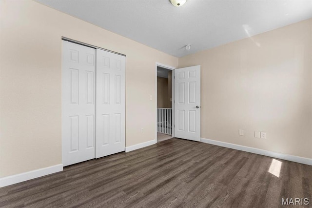 525 Homestead Ave, Swansea, IL 62226 - unfurnished bedroom featuring wood finished floors and a closet