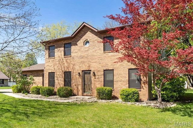 525 Homestead Ave, Swansea, IL 62226 - view of front of house featuring a front yard and brick siding