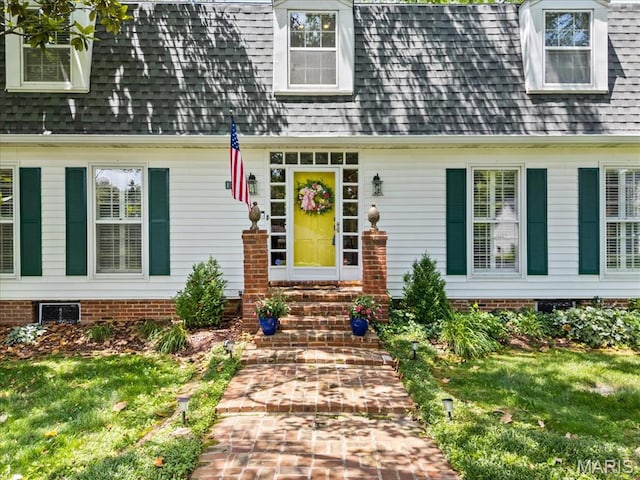 1843 Manor Hill Rd, Saint Louis, MO 63131 - doorway to property with roof with shingles and a yard