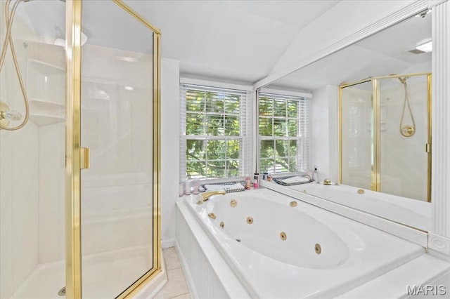 1843 Manor Hill Rd, Saint Louis, MO 63131 - bathroom featuring vaulted ceiling, a shower stall, a whirlpool tub, and tile patterned floors
