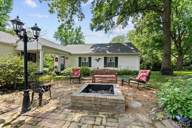 1843 Manor Hill Rd, Saint Louis, MO 63131 - view of patio featuring an outdoor fire pit