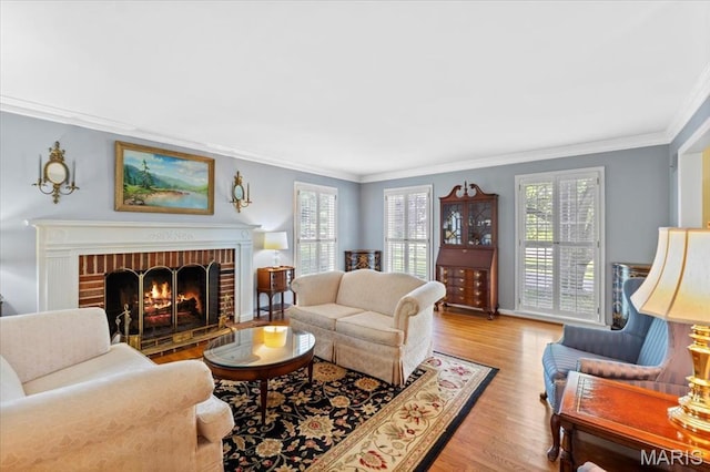 1843 Manor Hill Rd, Saint Louis, MO 63131 - living area with crown molding, plenty of natural light, wood finished floors, and a fireplace