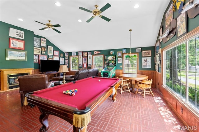 1843 Manor Hill Rd, Saint Louis, MO 63131 - rec room with vaulted ceiling, ceiling fan, a wainscoted wall, brick patterned floors, and billiards