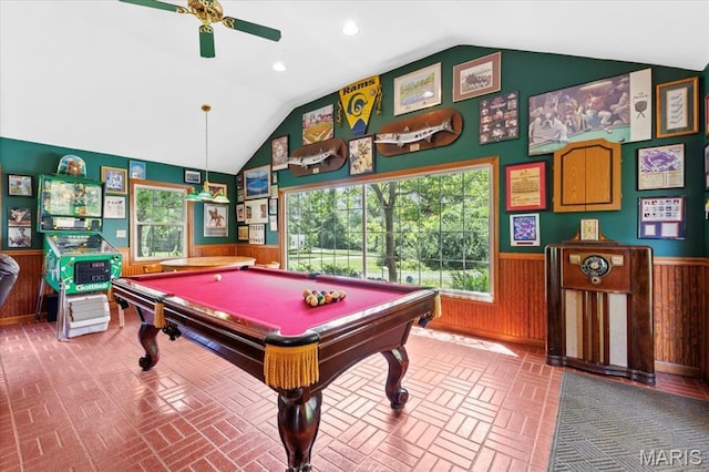1843 Manor Hill Rd, Saint Louis, MO 63131 - recreation room with vaulted ceiling, a wainscoted wall, healthy amount of natural light, a ceiling fan, and brick patterned flooring