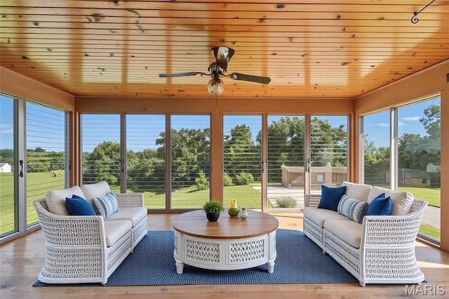 1467 Crystal Heights Rd, Crystal City, MO 63019 - sunroom with plenty of natural light, view of scattered trees, wooden ceiling, and wood finished floors
