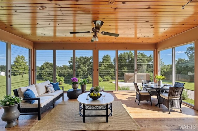 1467 Crystal Heights Rd, Crystal City, MO 63019 - sunroom / solarium with healthy amount of natural light, wood ceiling, view of scattered trees, and wood finished floors
