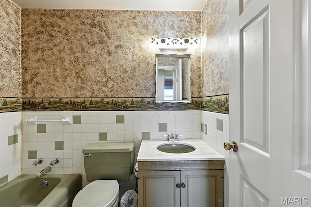 1467 Crystal Heights Rd, Crystal City, MO 63019 - full bath with a tub to relax in, vanity, tile walls, wainscoting, and wallpapered walls