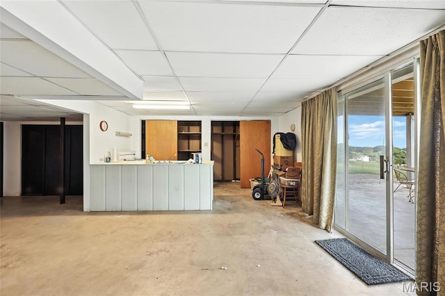 1467 Crystal Heights Rd, Crystal City, MO 63019 - living room featuring unfinished concrete floors and a paneled ceiling