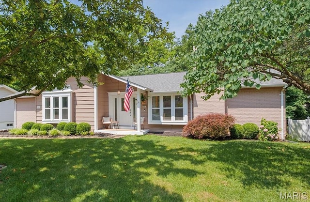 447 Maymont Dr, Ballwin, MO 63011 - view of front of house featuring brick siding and a front yard