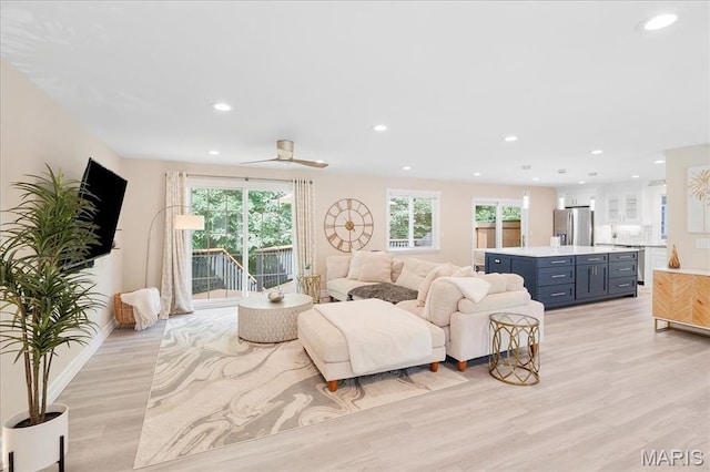447 Maymont Dr, Ballwin, MO 63011 - living room with light wood-style floors and recessed lighting