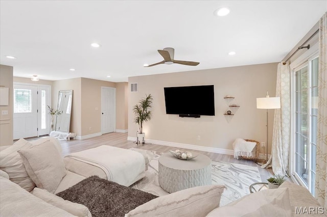 447 Maymont Dr, Ballwin, MO 63011 - living room featuring light wood finished floors, a ceiling fan, and recessed lighting