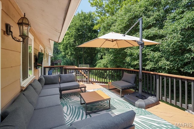 447 Maymont Dr, Ballwin, MO 63011 - deck with an outdoor living space and view of scattered trees