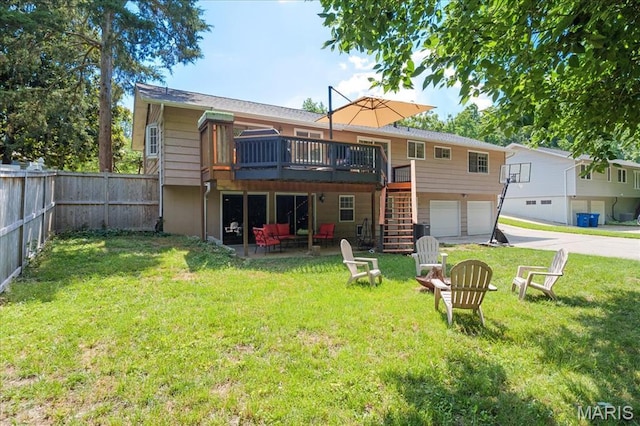 447 Maymont Dr, Ballwin, MO 63011 - back of house with a wooden deck, an attached garage, stairs, and driveway