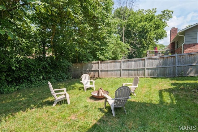 447 Maymont Dr, Ballwin, MO 63011 - view of yard featuring a fire pit