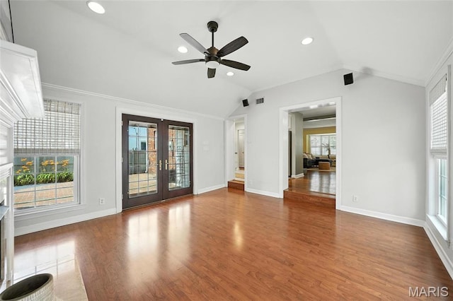 906 N Taylor Ave, Saint Louis, MO 63122 - unfurnished living room featuring french doors, vaulted ceiling, a ceiling fan, wood finished floors, and crown molding