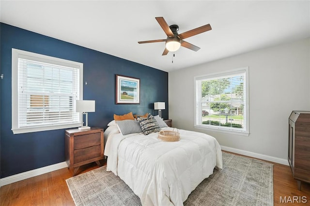 906 N Taylor Ave, Saint Louis, MO 63122 - bedroom featuring wood finished floors and a ceiling fan