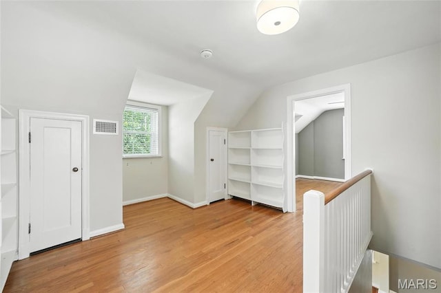 906 N Taylor Ave, Saint Louis, MO 63122 - bonus room with vaulted ceiling and light wood-type flooring