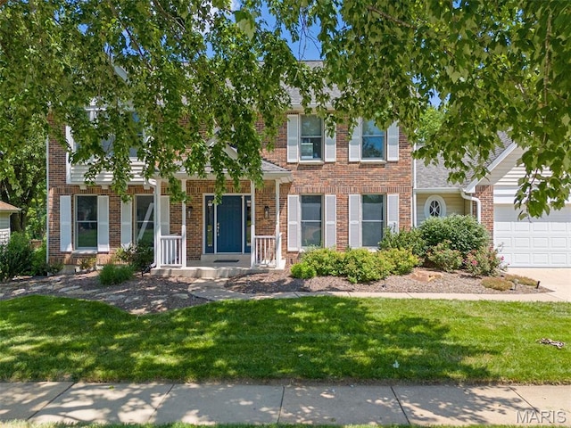 15747 Cedarmill Dr, Chesterfield, MO 63017 - view of front facade with a garage, a front yard, brick siding, and concrete driveway