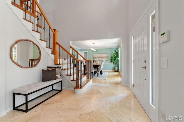 15747 Cedarmill Dr, Chesterfield, MO 63017 - foyer entrance with stairway and stone tile flooring