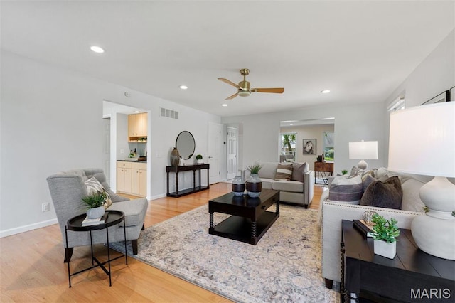 15747 Cedarmill Dr, Chesterfield, MO 63017 - living room featuring light wood finished floors, ceiling fan, and recessed lighting