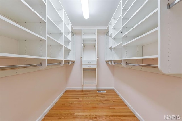 15747 Cedarmill Dr, Chesterfield, MO 63017 - spacious closet featuring wood finished floors