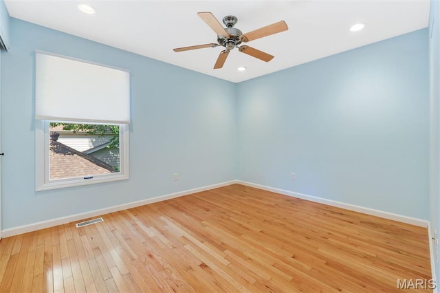 15747 Cedarmill Dr, Chesterfield, MO 63017 - spare room with light wood finished floors, a ceiling fan, and recessed lighting