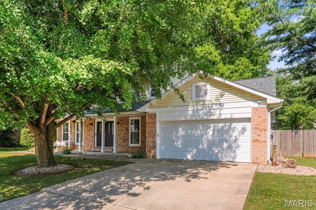 1026 Timber Creek Ln, Ofallon, IL 62269 - single story home with brick siding, driveway, and an attached garage