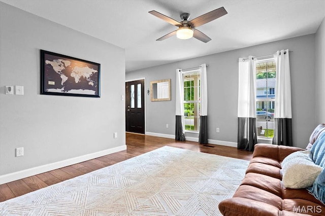 1026 Timber Creek Ln, Ofallon, IL 62269 - living area featuring wood finished floors and a ceiling fan