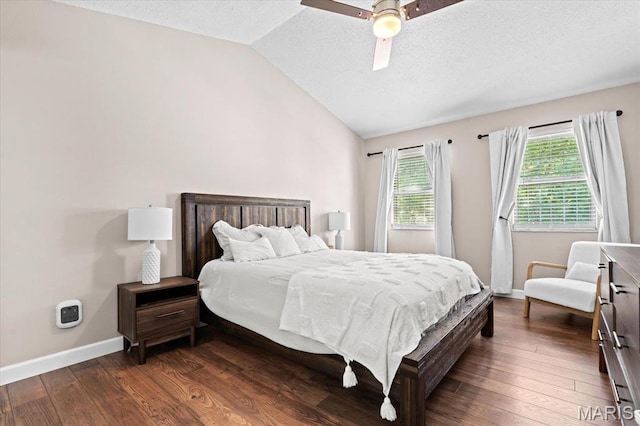 1026 Timber Creek Ln, Ofallon, IL 62269 - bedroom featuring lofted ceiling, dark wood-style floors, a textured ceiling, and ceiling fan