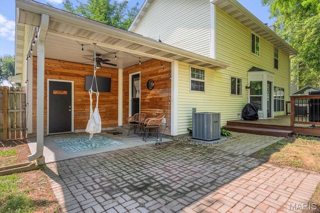 1026 Timber Creek Ln, Ofallon, IL 62269 - rear view of property with ceiling fan, a wooden deck, and a patio