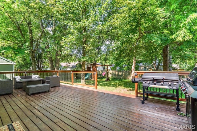 1026 Timber Creek Ln, Ofallon, IL 62269 - deck with an outdoor living space, a playground, a fenced backyard, and grilling area