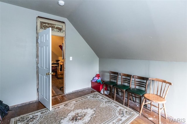 3815 N 20th St, Saint Louis, MO 63107 - living area featuring wood finished floors and lofted ceiling