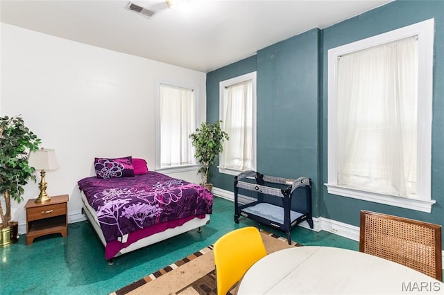 3815 N 20th St, Saint Louis, MO 63107 - carpeted bedroom with baseboards