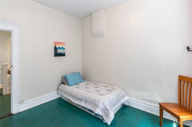 3815 N 20th St, Saint Louis, MO 63107 - bedroom with baseboards and carpet