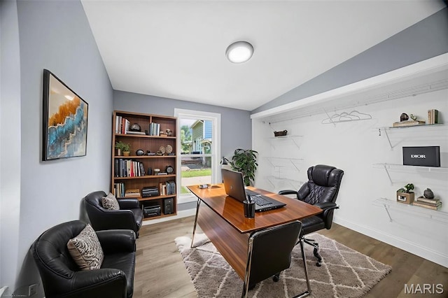 6822 Friarwood Dr, Saint Louis, MO 63134 - office area with vaulted ceiling and wood finished floors