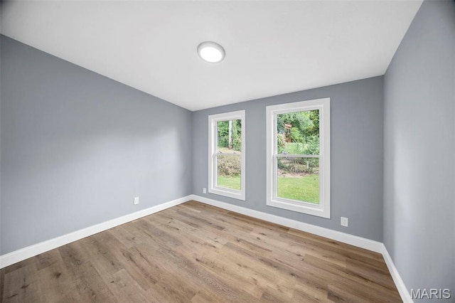 6822 Friarwood Dr, Saint Louis, MO 63134 - unfurnished room with wood finished floors