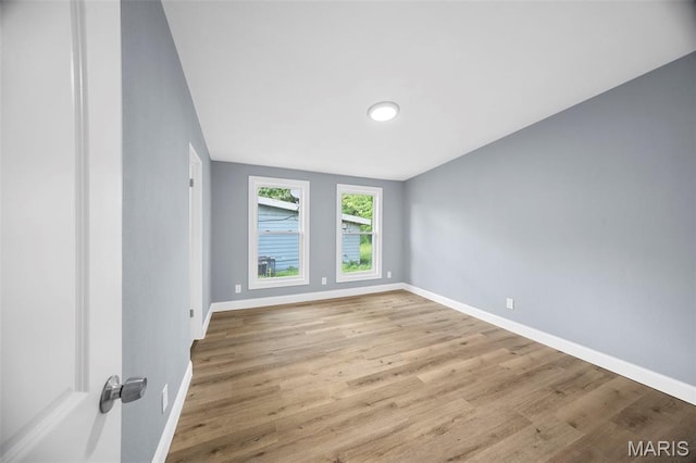6822 Friarwood Dr, Saint Louis, MO 63134 - unfurnished room featuring wood finished floors