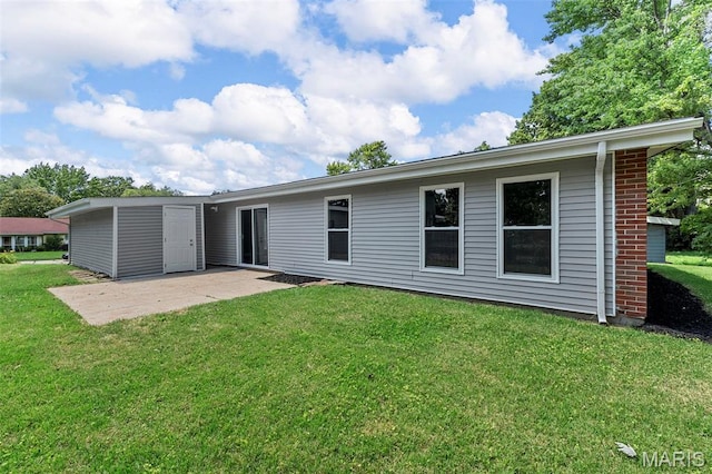 6822 Friarwood Dr, Saint Louis, MO 63134 - rear view of house featuring a patio and a lawn