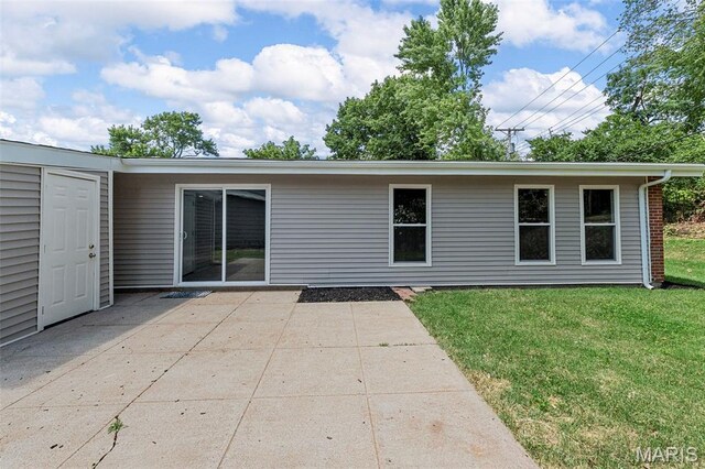 6822 Friarwood Dr, Saint Louis, MO 63134 - rear view of property featuring a yard and a patio