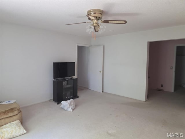 478 Batchtown Rd, Batchtown, IL 62006 - unfurnished living room with carpet and a ceiling fan