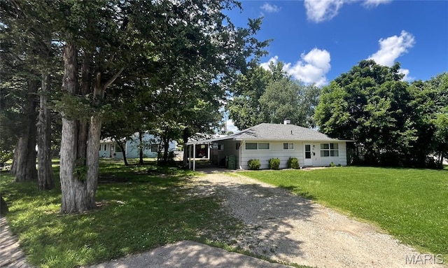33 Southbrook Dr, Rolla, MO 65401 - view of front of property with dirt driveway, a front yard, and a chimney