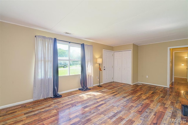 33 Southbrook Dr, Rolla, MO 65401 - unfurnished bedroom with wood finished floors and ornamental molding