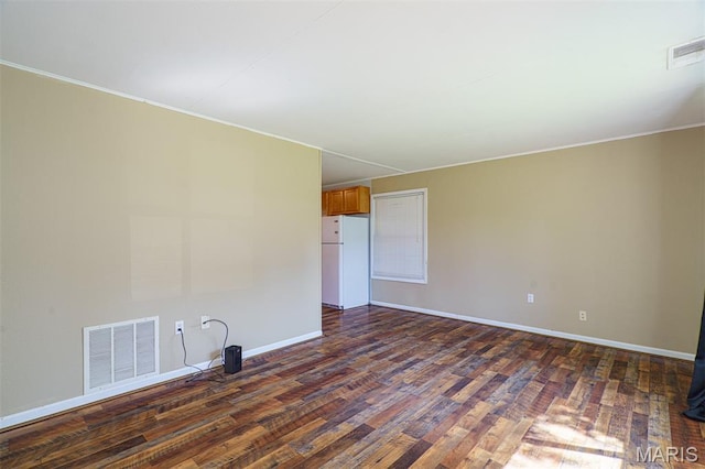 33 Southbrook Dr, Rolla, MO 65401 - spare room featuring dark wood-style floors and ornamental molding