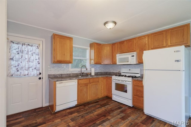 33 Southbrook Dr, Rolla, MO 65401 - kitchen with white appliances, dark wood finished floors, ornamental molding, dark countertops, and tasteful backsplash